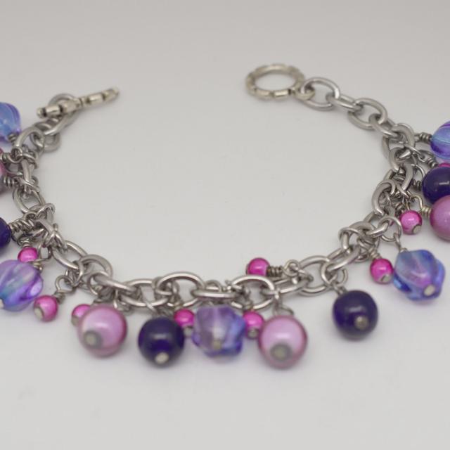 purple pink bead charm bracelet.jpg